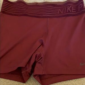 Maroon Nike Pro shorts